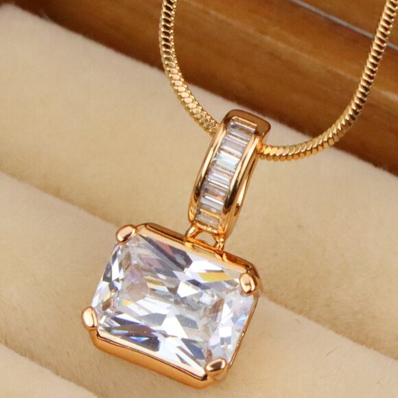 "Elegant White Stone Pendant in Gold Finish with Baguette Detailing, XPPT1777 - Picture 1 of 13